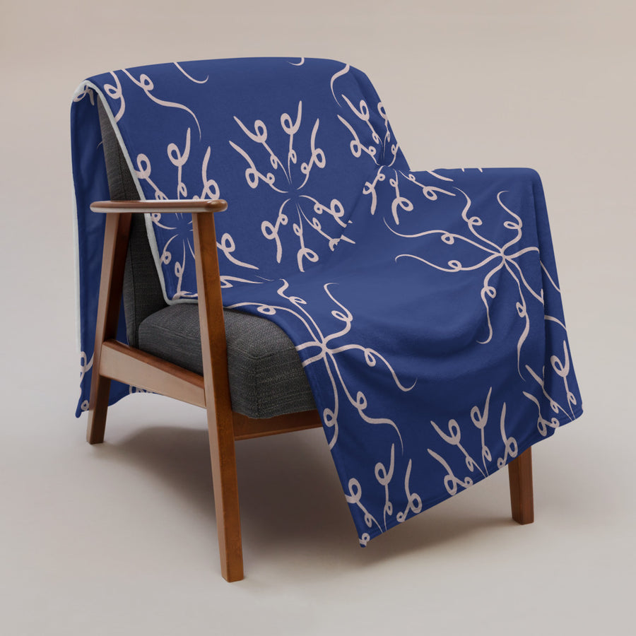 Curl Cross Fleece Blanket mockup 1